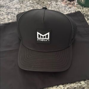 Melin Black Odyssey Brick Hat Cap - Classic Size - SnapBack w/ Drawstring Bag